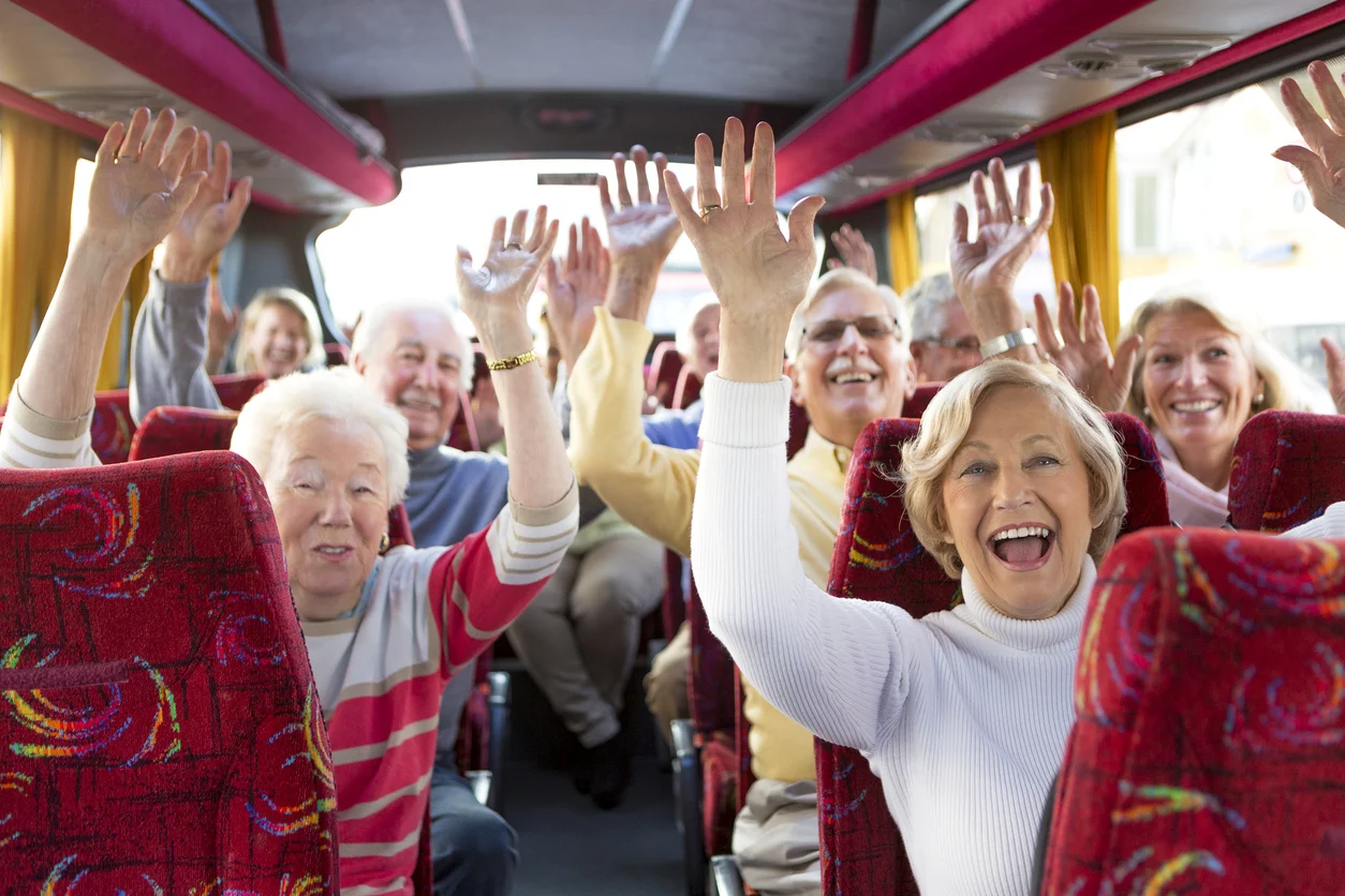 group of older adults on a bus